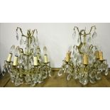 A pair of 19th Century gilt six branch Ceiling Lights, with cutglass droplets and pillars,