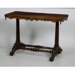 A rectangular Victorian mahogany Centre Table, raised on two tapering reeded columns,