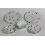 A pair of leaf shaped Meissen porcelain Dishes, each with rustic handles,