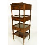 A Regency period ebony strung mahogany four tier Whatnot,