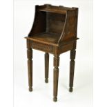 An unusual 19th Century carved oak Bookstand, with single shelf on reeded tapering legs.