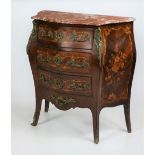 A very attractive bombé shaped French rosewood and marquetry Commode,