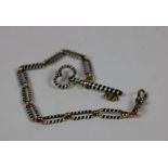 An Albertini Chain, comprising of fettle shape links, watch key to end,