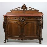 An attractive carved walnut Buffet,