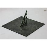 An early 19th Century square bronze Sundial, with openwork gnomon, apparently unsigned, 12" (30cms).