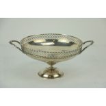 An English silver two handled circular Fruit Bowl Tazza, with pierced side, by Walker & Hall,