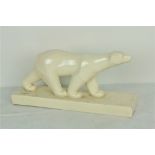 A scarce cream ceramic Model of a Polar Bear, signed Lauroff.