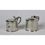 A Victorian silver Mustard Pot, with hinged lid and scroll handle and blue liner, London "S.C.