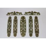 A set of 4 - 19th Century cast and pierced brass Finger Plates, each in the rococo style,