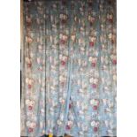 A pair of blue ground Curtains, decorated with colourful flowers and birds,