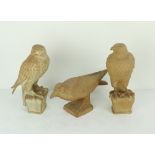 An unglazed pottery Figure of a Kestrel, another similar ditto 12" (31cms),