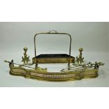 An attractive serpentine shaped pierced brass Fender, with beaded decoration, rosettes etc.