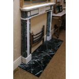 An attractive early 19th Century white and speckled green marble Fireplace, of small proportions,
