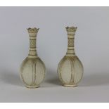 A good pair of Copeland Crystal Palace Art Union Parian Ware Vases, in relief with gilt highlights,