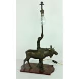 A simulated bronze Model of a Moose, on a shaped base, as a lamp, some damage.
