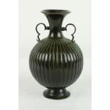 Just Andersen, Denmark 1884-1943 An unusual heavy bronze Danish two handled Vase, with reeded body,