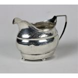 A Provincial bright cut silver Cream Jug, with reeded rim and attractive design, stamped S.G.