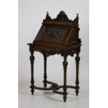 A carved oak Ladies Bureau, in the Renaissance style,