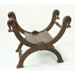 An early heavy 20th Century Oriental carved hardwood X frame Chair,