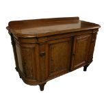 A Victorian walnut Buffet, with moulded shape top over two panel doors with dome ends,