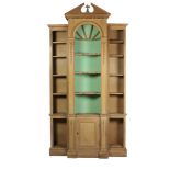 An attractive pair of small breakfront carved pine Bookcases,