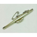 A silver and gold Brooch, with five stone ring mount set with five old cut diamonds (approx. .