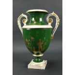 An early 19th Century green ground Urn,