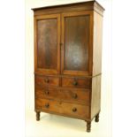 A 19th Century Nelson period figured mahogany two door Linen Press,