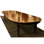 An exceptionally large Victorian telescopic mahogany Dining Table, attributed to Robert Strahan,