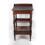 An early 19th Century mahogany Porters Desk, with lift up top on turned supports and legs.