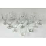 A varied collection of antique Drinking Glasses, including three tall engraved Glasses,