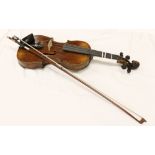 A 19th Century mahogany cased Violin, with label "Joseph Guarnerius, maker,