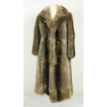 [ALL COATS IN VERY GOOD CONDITION] A grey and beige Ladies Fur Coat.