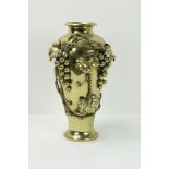 A tall Oriental brass Vase, with caricature mark on base, approx.