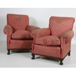 A pair of Chippendale style Easy Armchairs, with cushion seats and covered in check fabric,