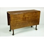 A fine quality 19th Century Irish elm drop leaf Table, with rectangular flaps,