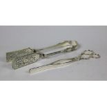An attractive and heavy pierced English silver Kings pattern Asparagus Lifter, London c.