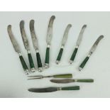 A set of 10 green porcelain handled Dinner Knives,