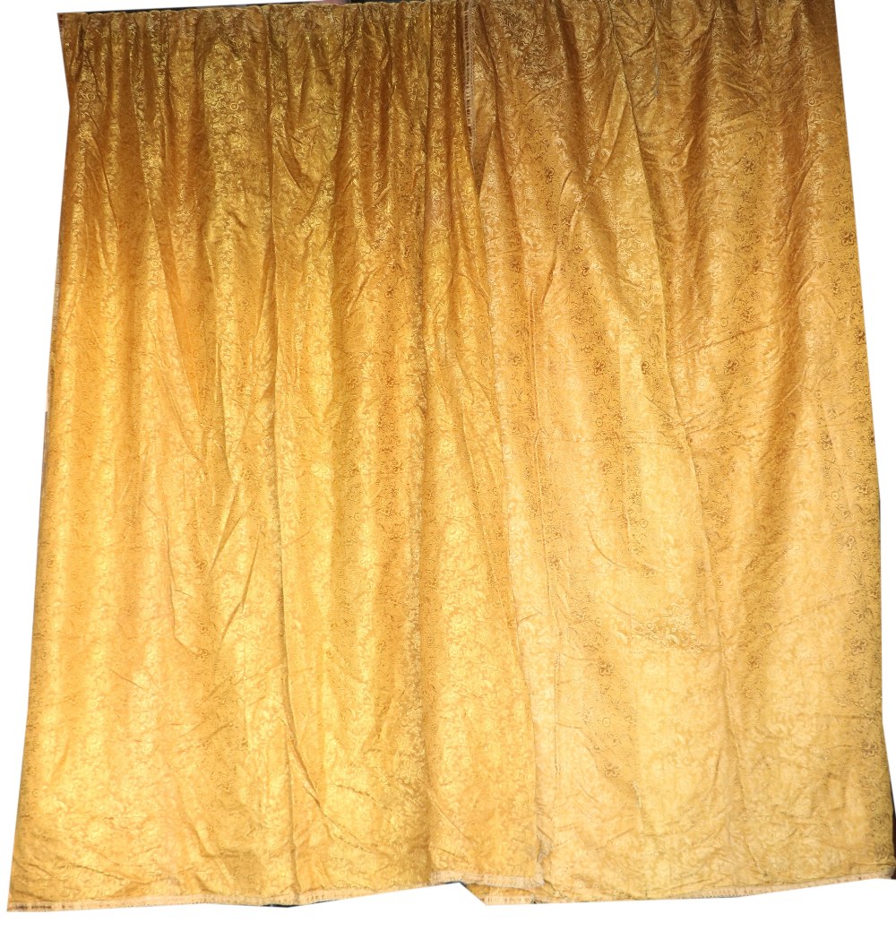 Two pairs of self-printed gold ground lined Curtains, with floral design,