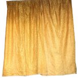 Two pairs of self-printed gold ground lined Curtains, with floral design,