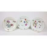 A set of three 19th Century Meissen porcelain Bowls, each decorated with flowers and insects,