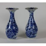 A pair of Japanese blue and white porcelain Vases, decorated with flowers,