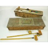 An old Lawn Croquet Set, 4 mallets, balls, markers etc.,in original wooden box. As a collection, w.