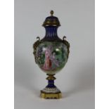 A Serves style brass mounted porcelain Vase and cover,