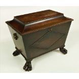 An attractive William IV Irish mahogany sarcophagus shaped Cellarette,