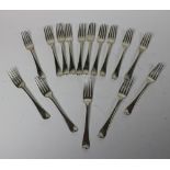 A very good heavy set of 15, George III English silver Dinner Forks, London c. 1810, by Wm.