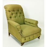 A late 19th Century Armchair, covered in green cloth, with deep buttoned back and front,