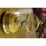 An attractive gilded brass Automaton Bird Cage,