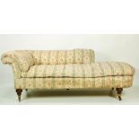 A very good quality late 19th Century Howard & Sons Chaise Longue or Day Bed, three quarter back,