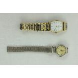 A Ladies Longines Watch, with white face and Roman numeral dial,